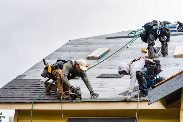 Professional Roofing technician working in North Palm Springs, CA